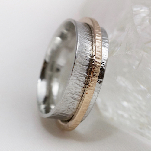 platinum and rose gold spinner ring