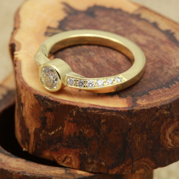 Environmentally Friendly Gold Twist Diamond Engagement Ring