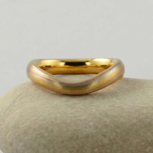 The Kamanashi: Yellow Gold Curved Mokume Gane Wedding Ring with Rose Gold and Silver