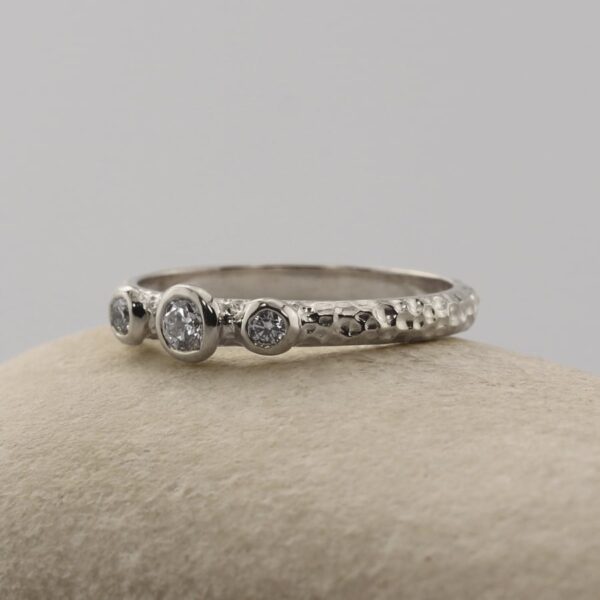 The White: 950 Platinum Diamond or Moissanite Trilogy Engagement Ring