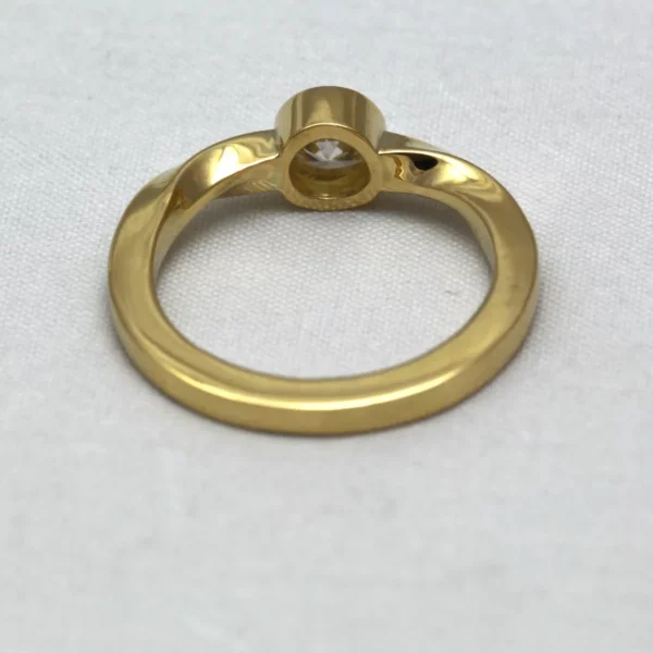 The Urie: Rub Over Set 14ct Yellow Gold Moissanite or Diamond Twist Engagement Ring