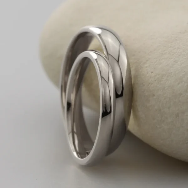 The Devons: Handmade 950 Platinum Matching Wedding Ring Set
