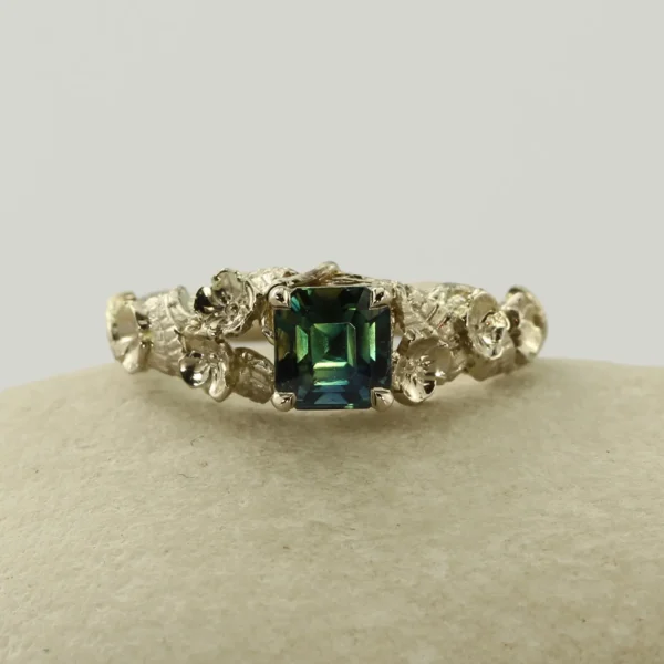 The Elan: Handmade 18ct White Gold Radiant Cut Sea Green Sapphire Floral Engagement Ring